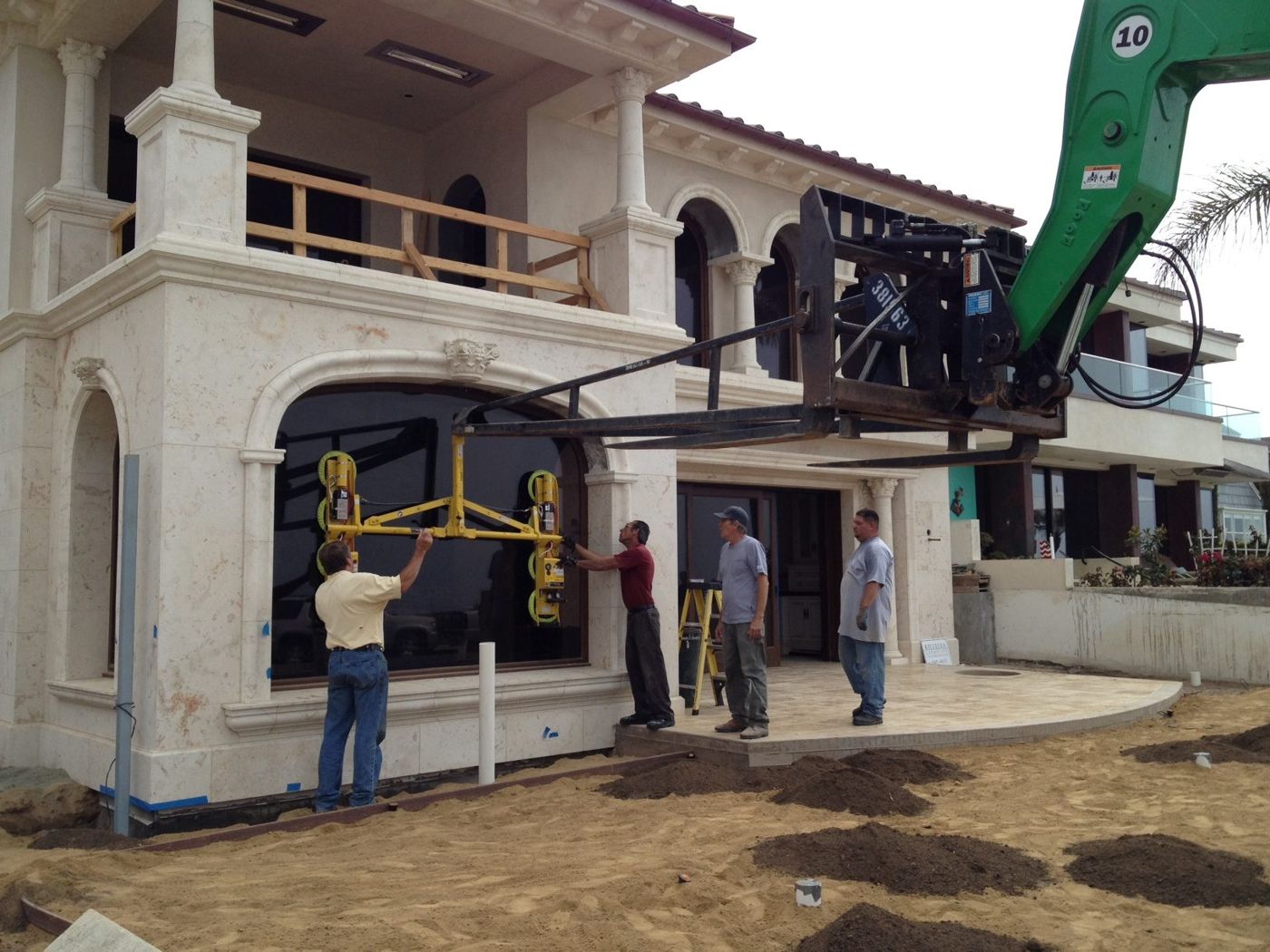 Black-frame casement window installation in Encinitas, CA