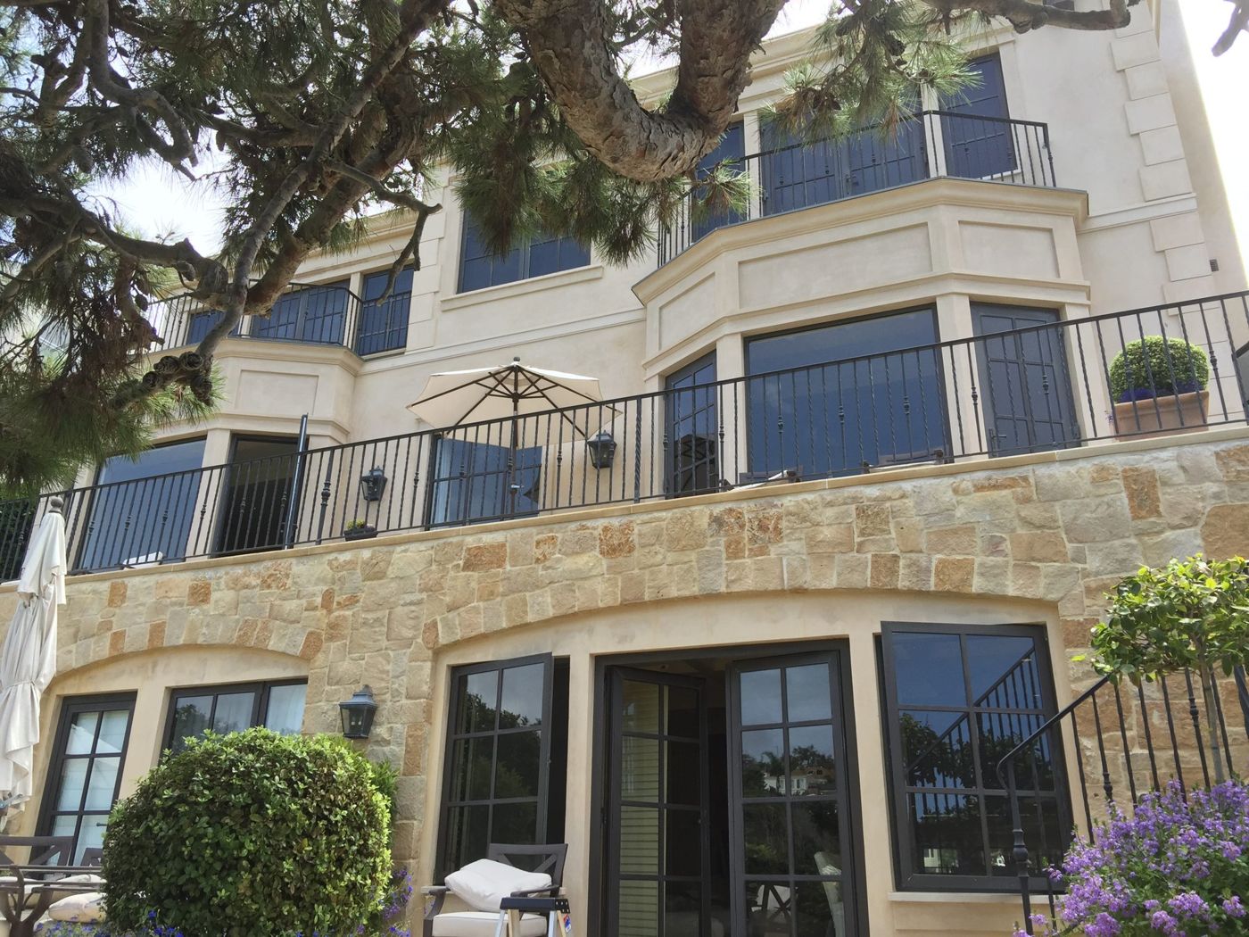Dark-framed bifold door installation in San Clemente, CA